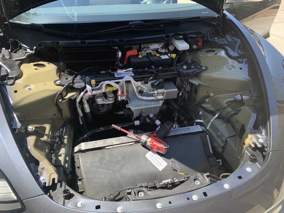 Tesla-Model3-Under-Frunk_1.thumb.jpg.147e1d76ae69c18a336a48339cb2f7a4.jpg