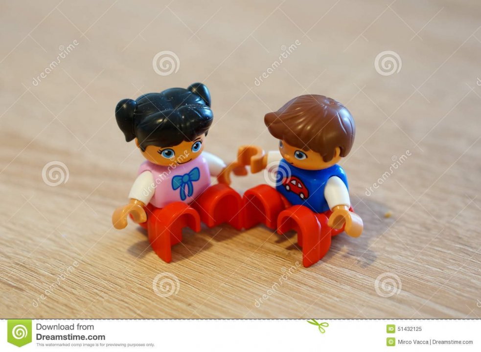 sitting-lego-figures-duplo-boy-girl-51432125.jpg