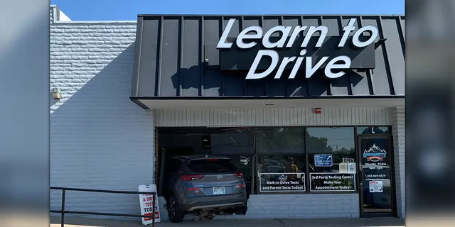 d2747598-Driving-instructor-crashes-into-building.webp.60eb7692f58fa14e00ed88655925b2f2.webp